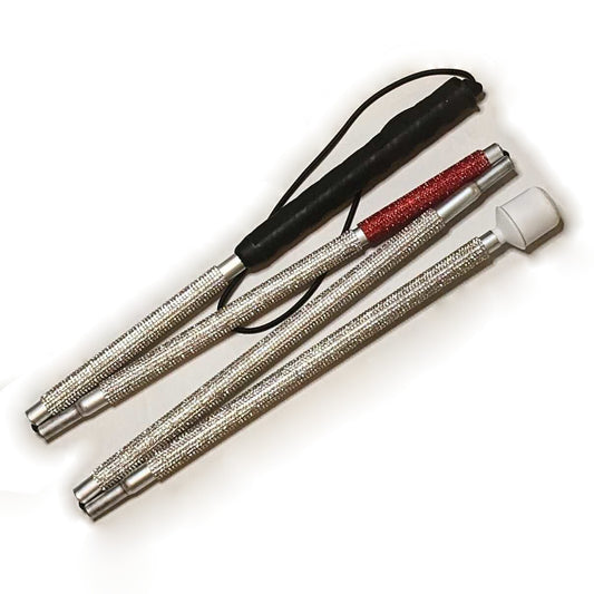 A blind cane designed with rhinestones, designed silvery white with a red strip to mirror a regular blind cane pattern