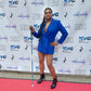 Lachi, a beautiful black woman, poses with a blue and white glam cane